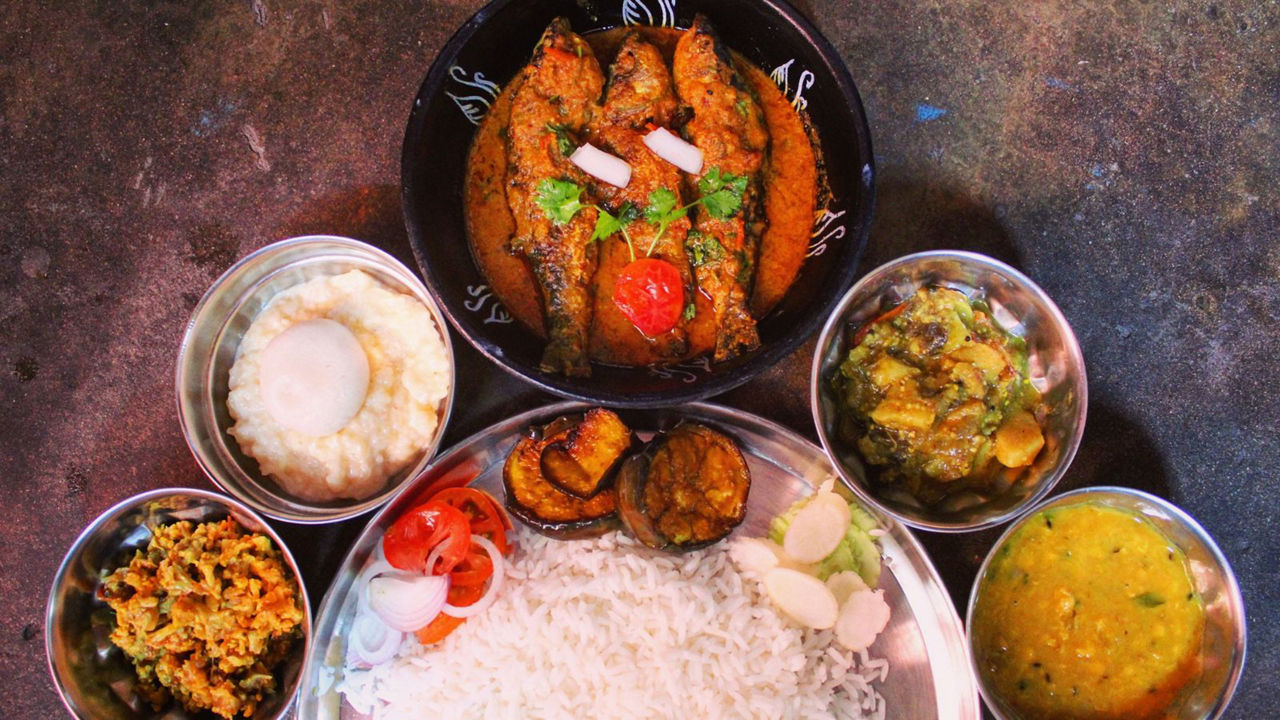 Traditional Indian Thali with Fish Curry
