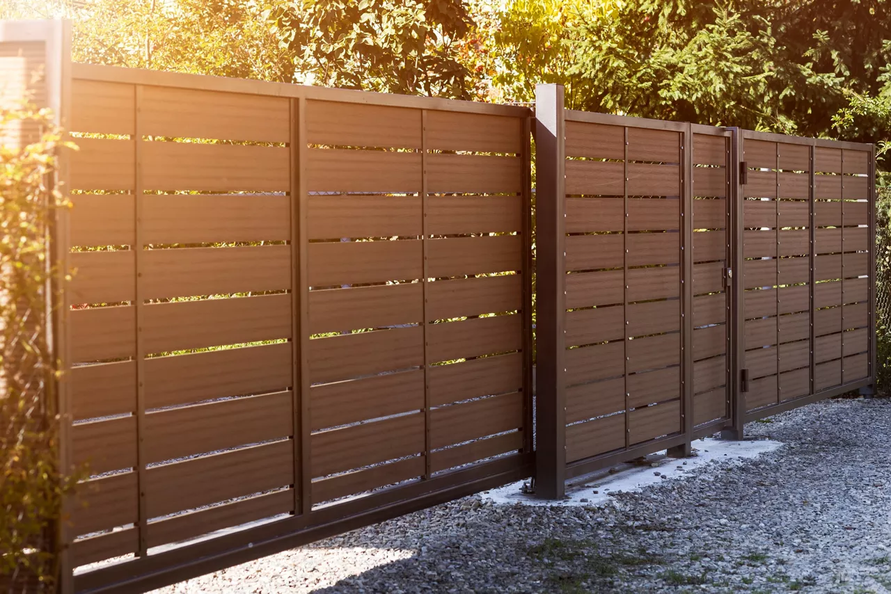 Entrance Sliding Gate with Metal Fence. Modern Automatic Gate to Private