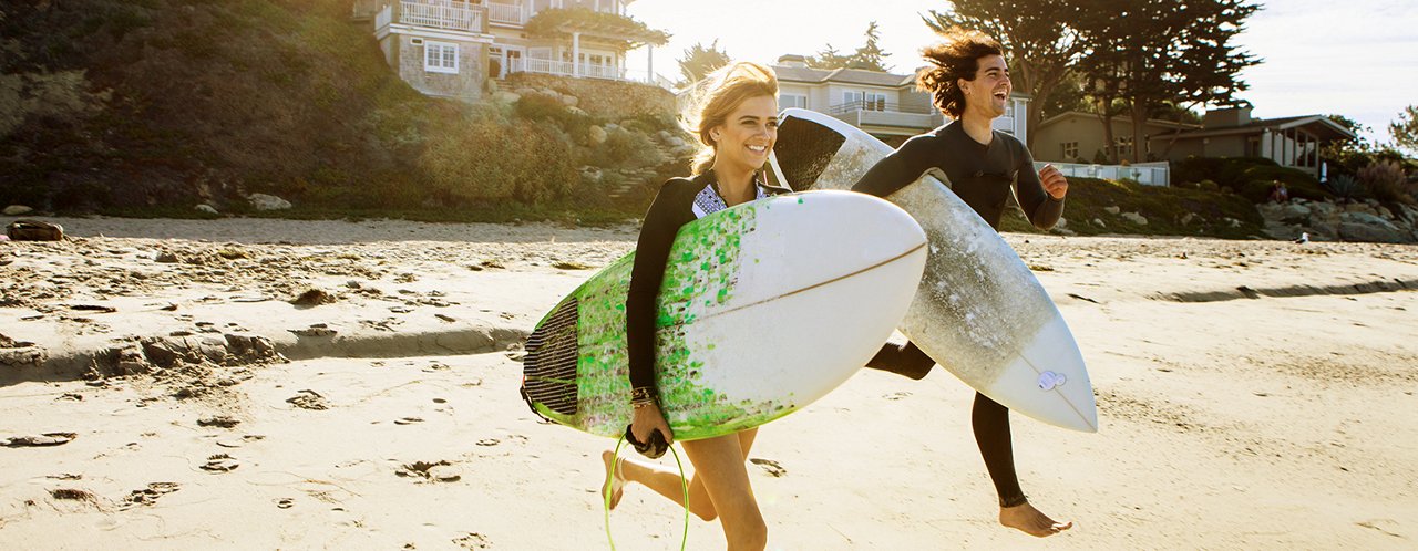 surfers running