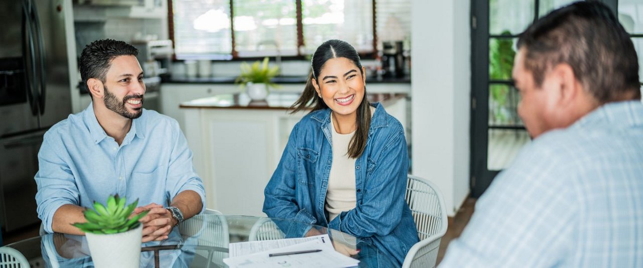 Couple meeting with adviser
