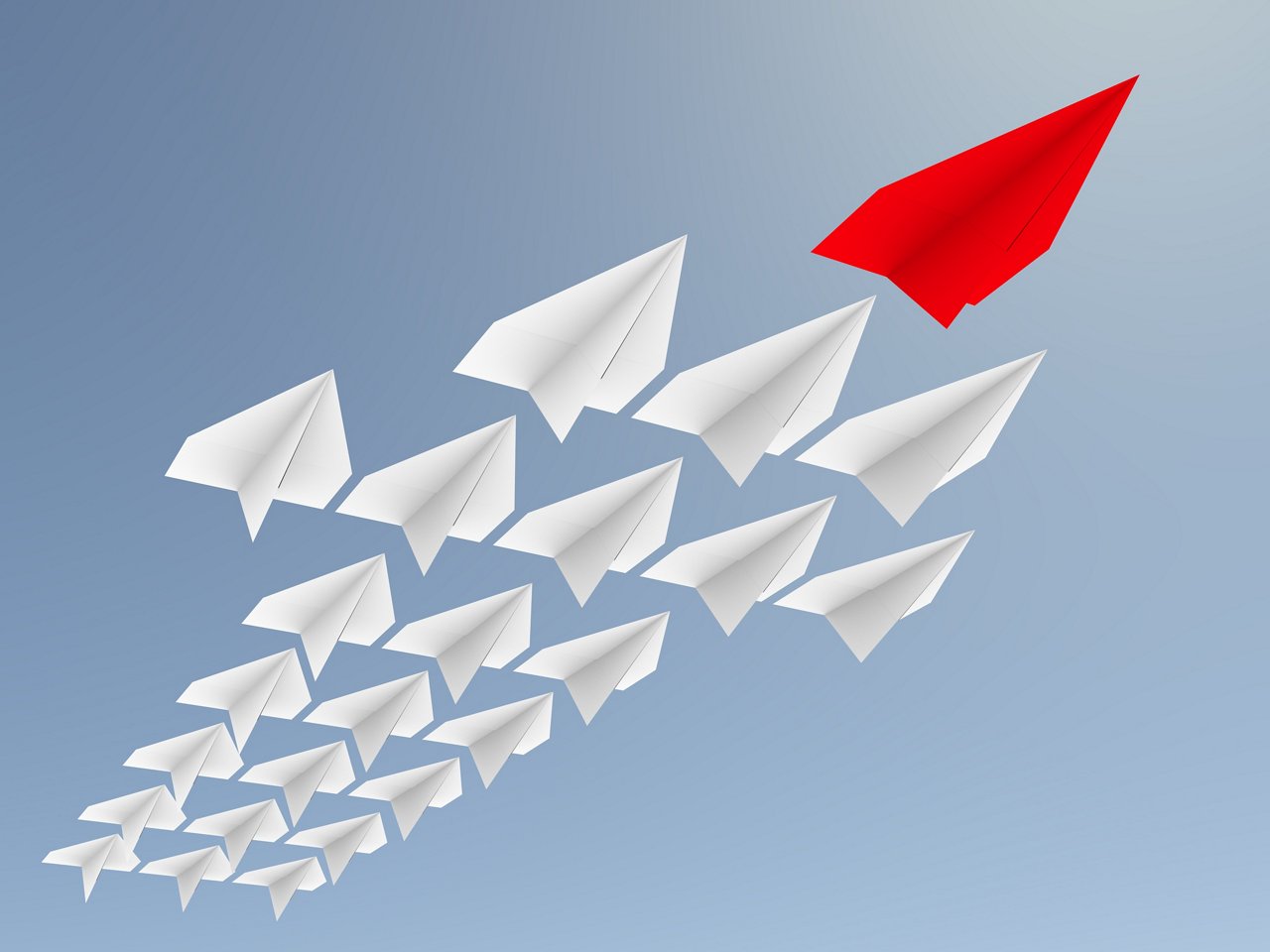  Leadership concept. One red leader plane leads other white planes forward