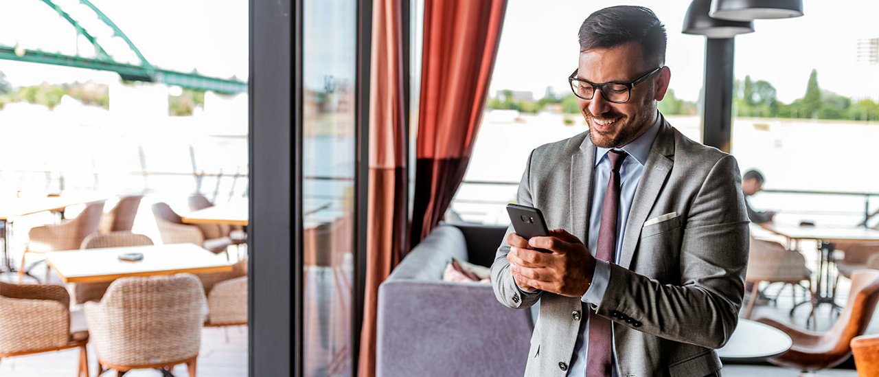 Businessman looking at mobile phone