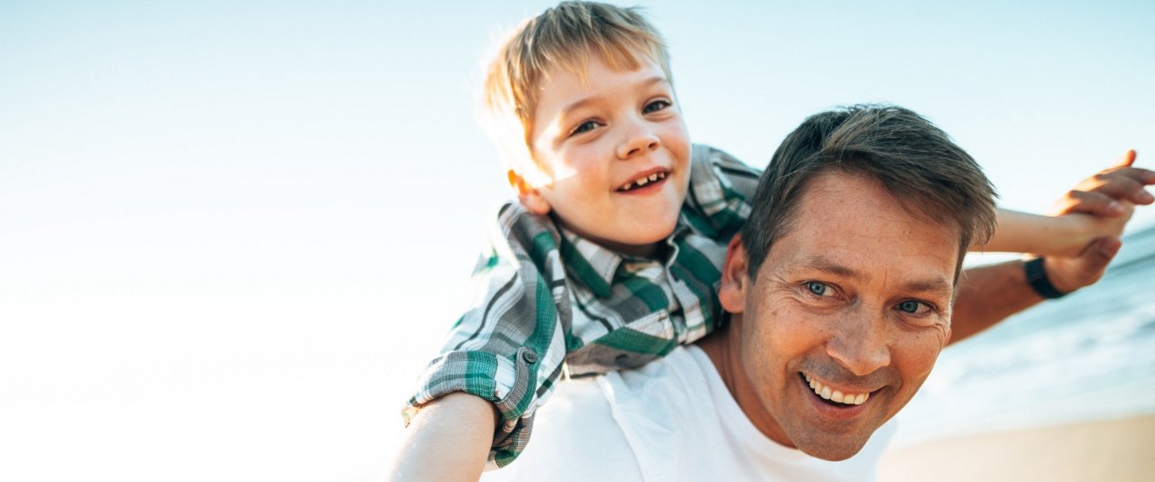 Son on father's shoulders