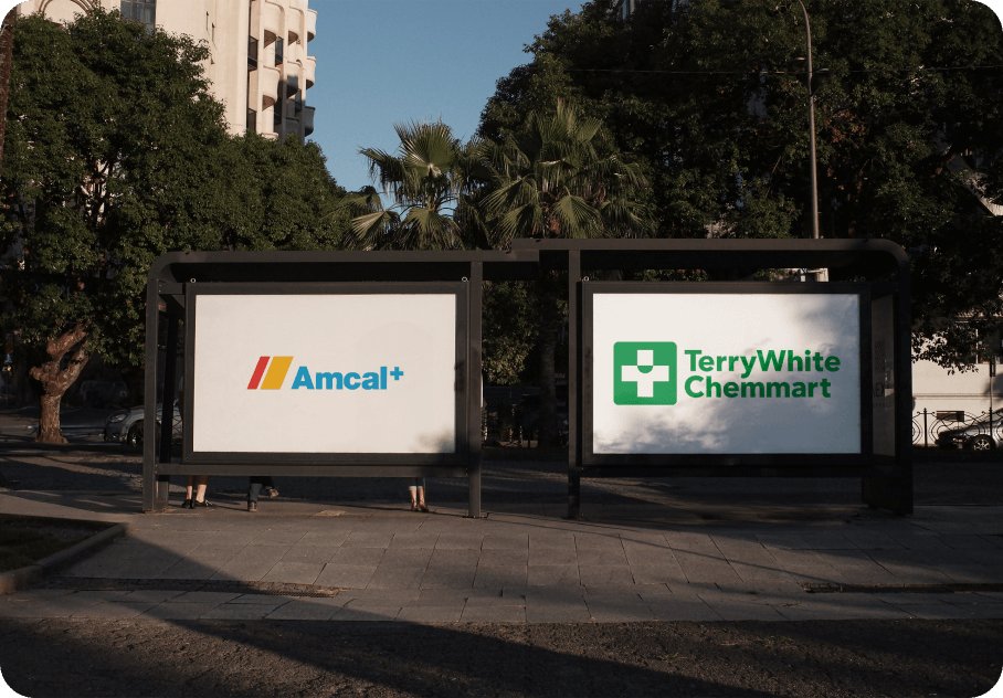 Amcal and TerryWhite Chemmart logos on bus stop billboards.