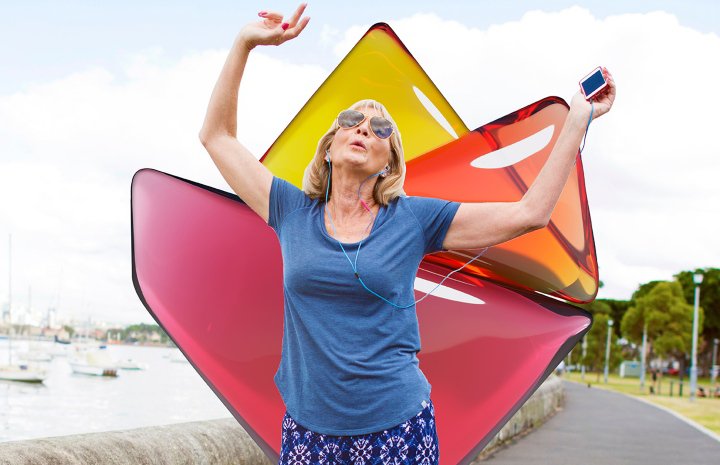 Lady with hands in the air celebrating while exercising