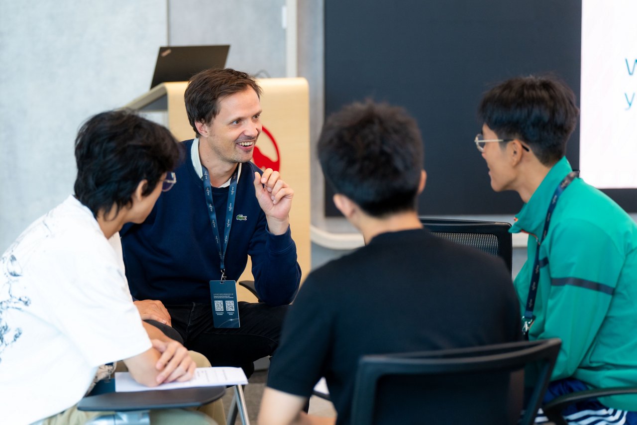 Lovely Asian girl and mother celebrating birthday with friends / family by having a virtual birthday party at home. Enjoying birthday celebration in front of the laptop during pandemic. Practicing social distancing. Birthday lifestyle theme