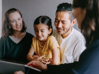 Family listening to adviser