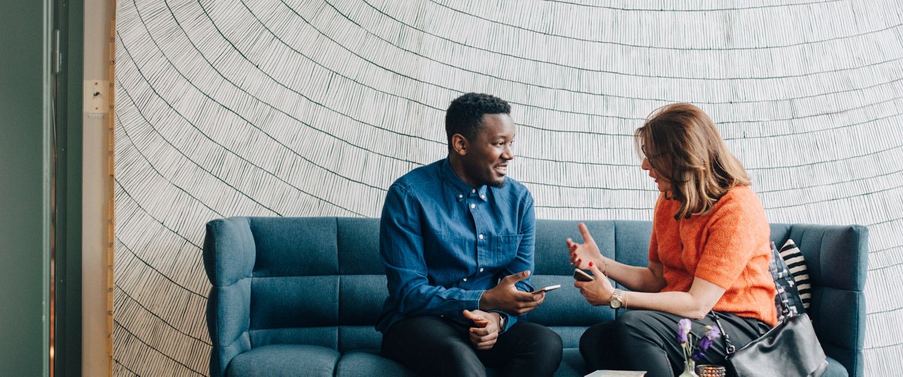 man and woman chatting