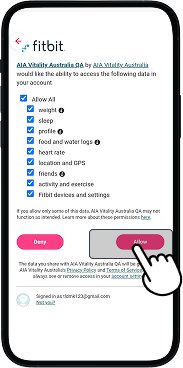 Fitbit app permission screen with Agree button highlighted for consent
