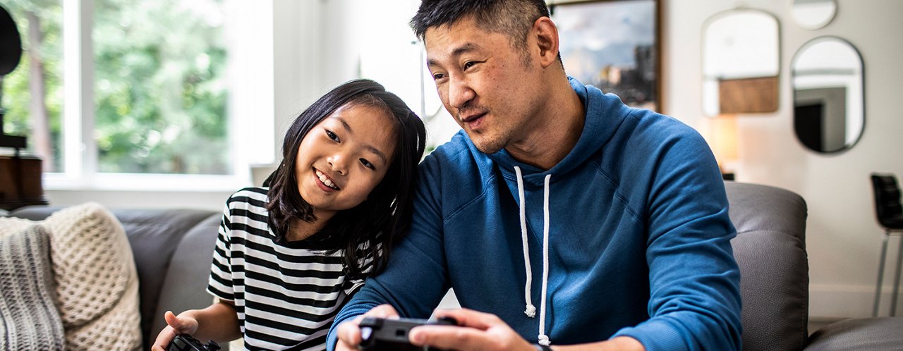 father and daughter gaming