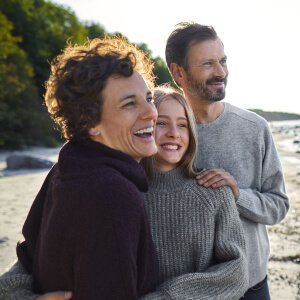 A joyful family at the beach