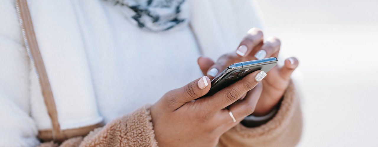 woman with mobile in hands