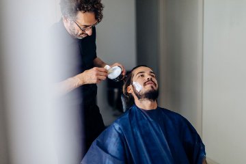Man at hairdressing appointment