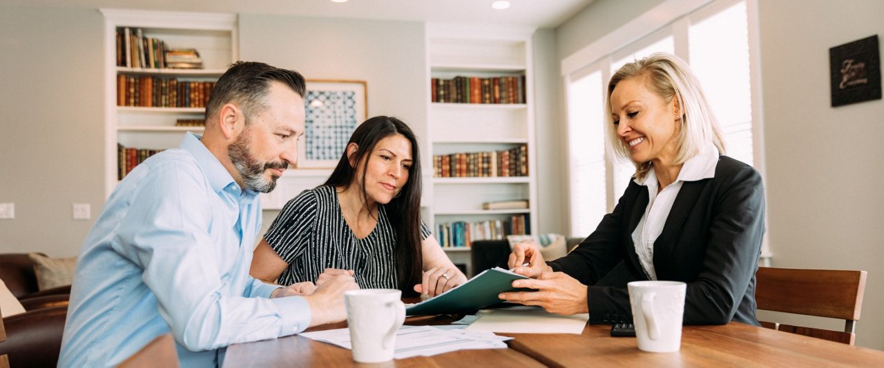 Couple meeting with advisers