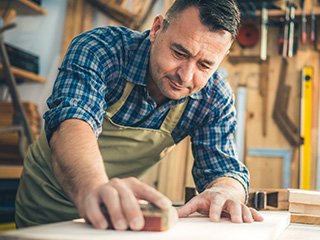 Man working with wood