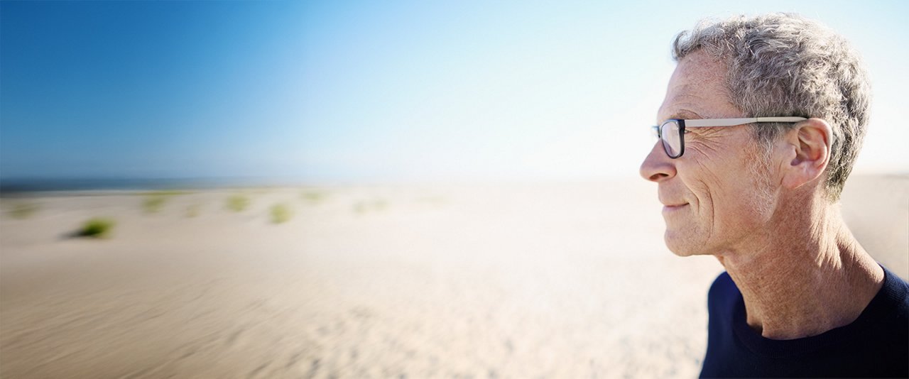 Male looking out at the beach