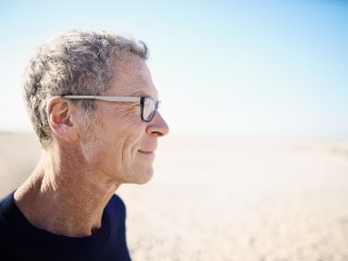 Man looking out at beach