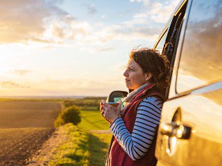 Lady looking out of car window