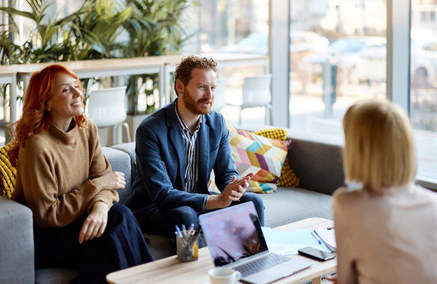 Couple meeting adviser