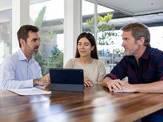 Couple meeting financial planner