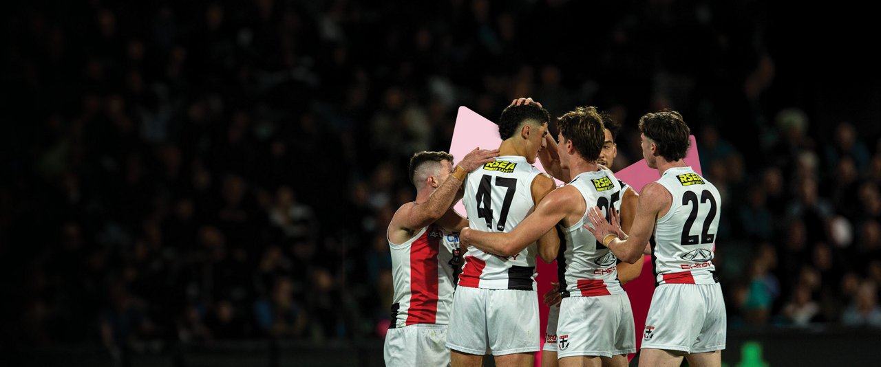 AFL Saints players celebrating in the game