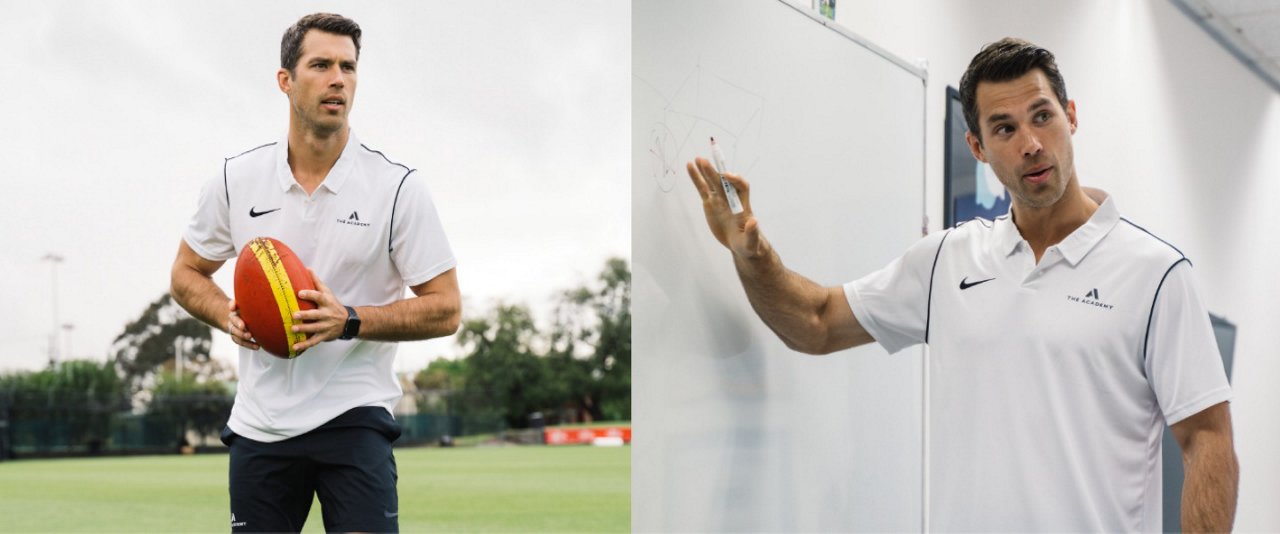 Man with an AFL ball and at a whiteboard