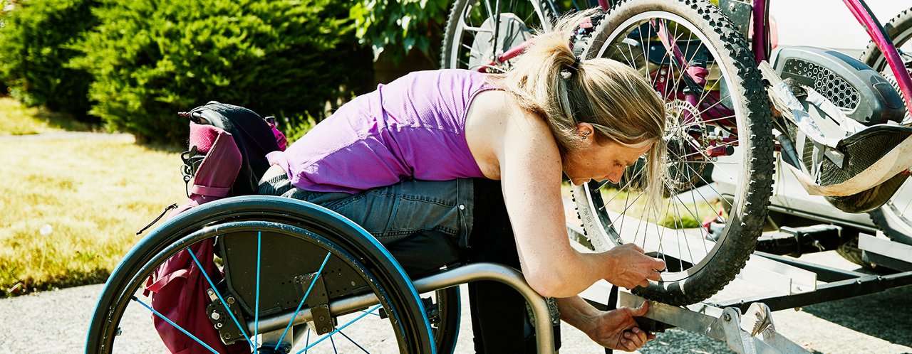 woman fixing bike