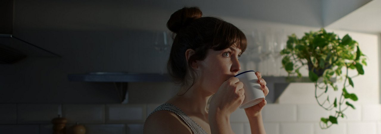 Woman holding coffee mug