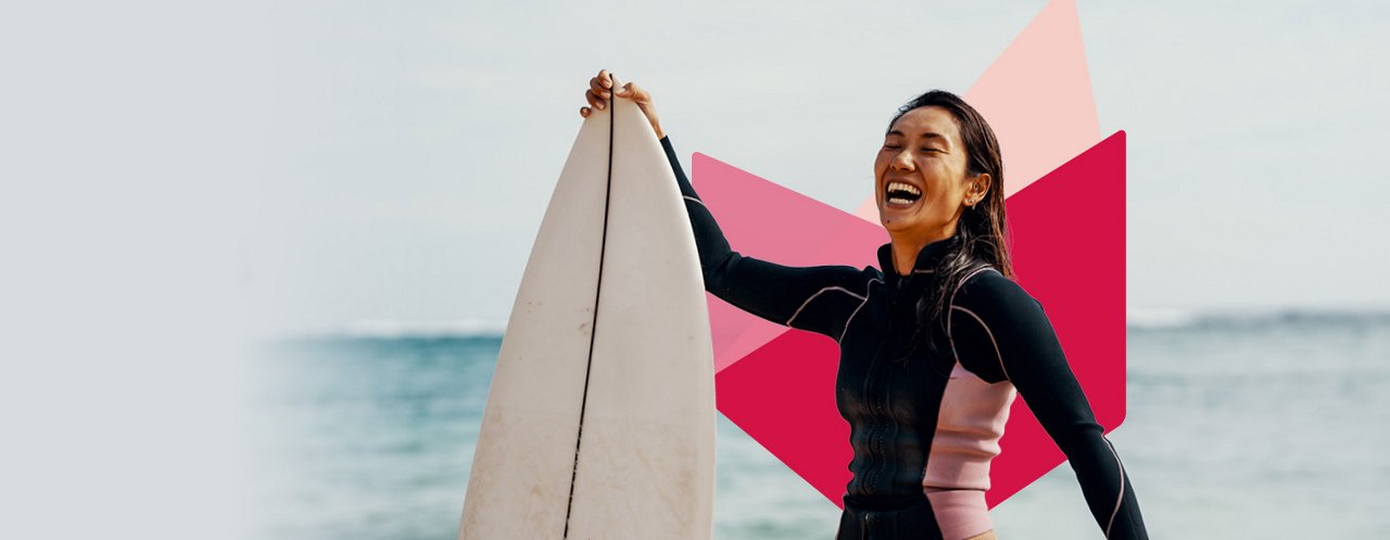 woman holding surfboard