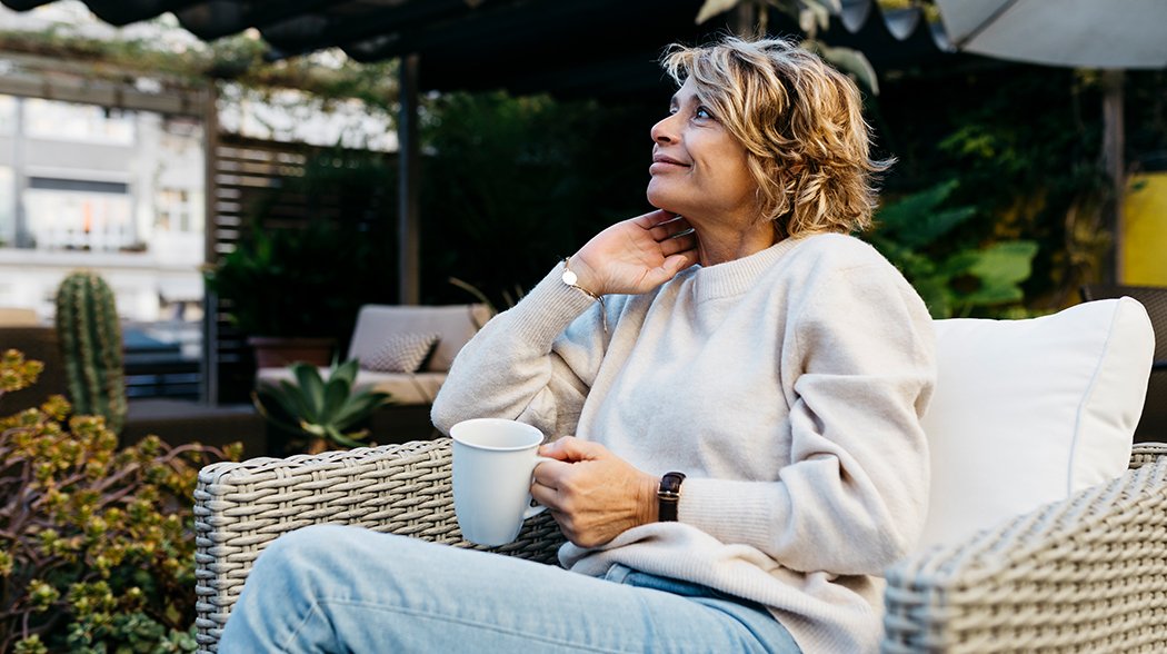 Woman holding coffee mug