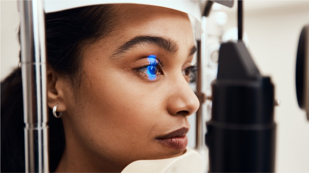 a woman undergoing an eye check procedure