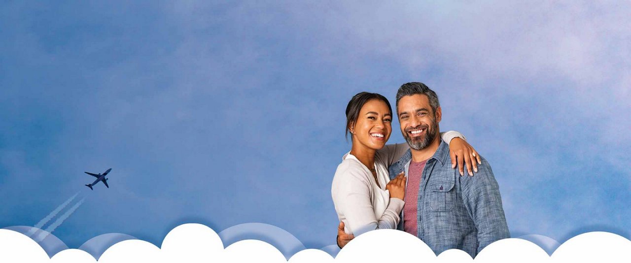 Couple embracing on a cartoon cloud