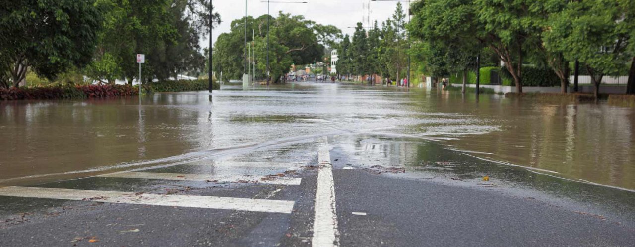 flood water running on the sides of road