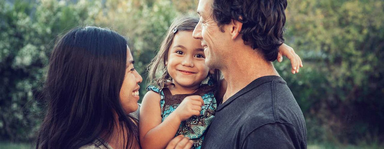 family holding child