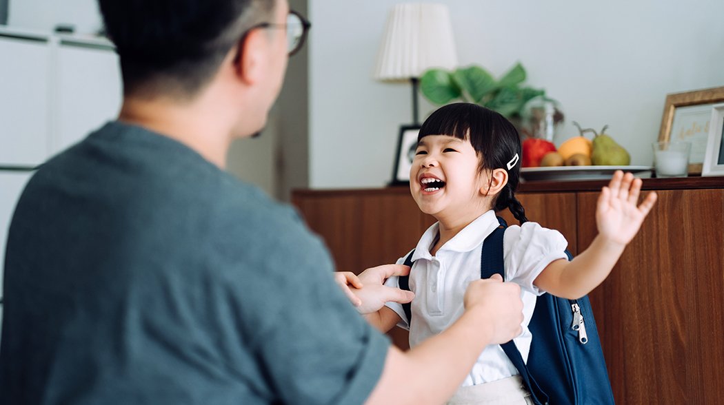 dad dressing up daughter