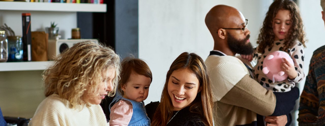 people holding kids