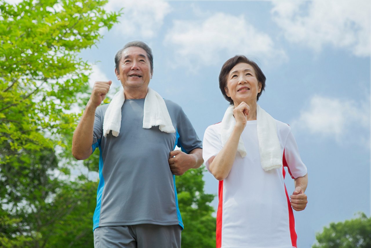 A senior couple walking together outdoor