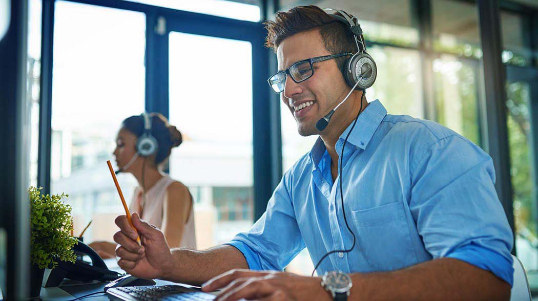 man talking while wearing headphones