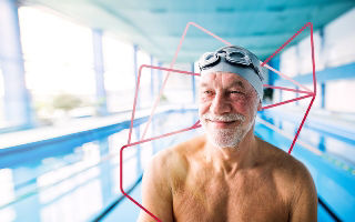 an old man standing in swimsuit