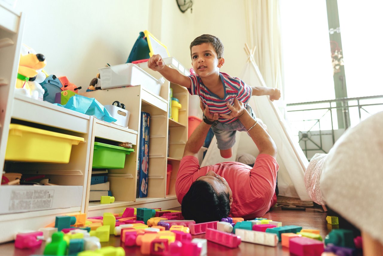 Indian father spends quality time and plays superhero with his son