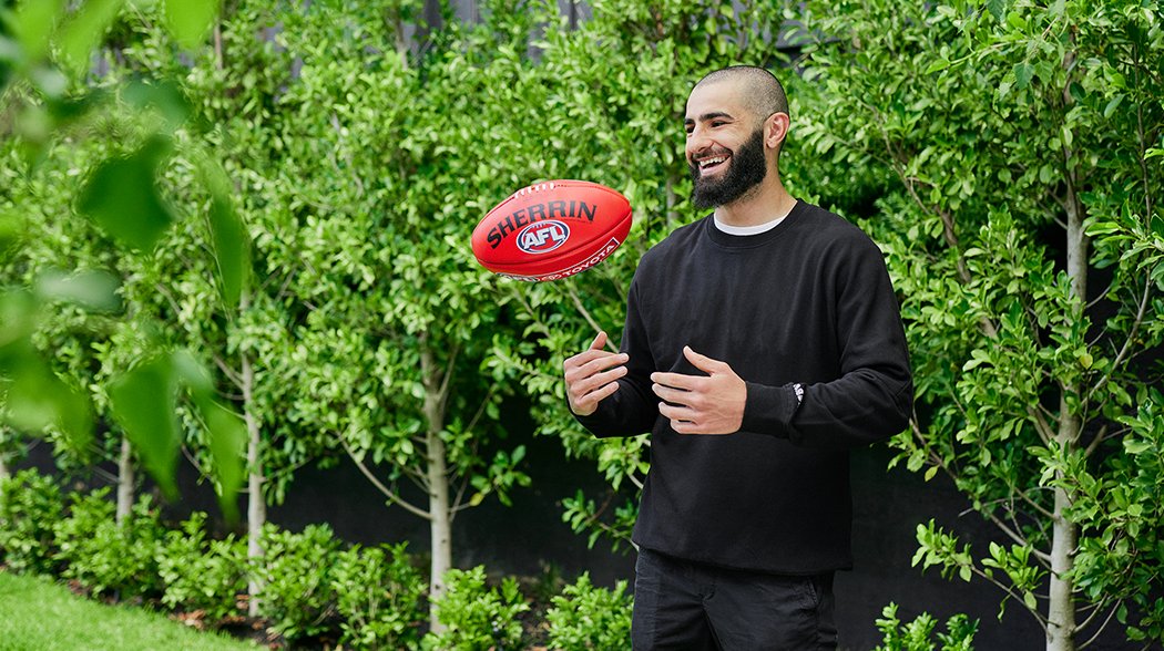 a man playing with a ball