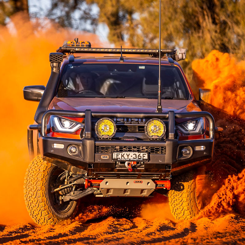 Isuzu D-Max on a dusty road equipped with an ARB Bull Bar