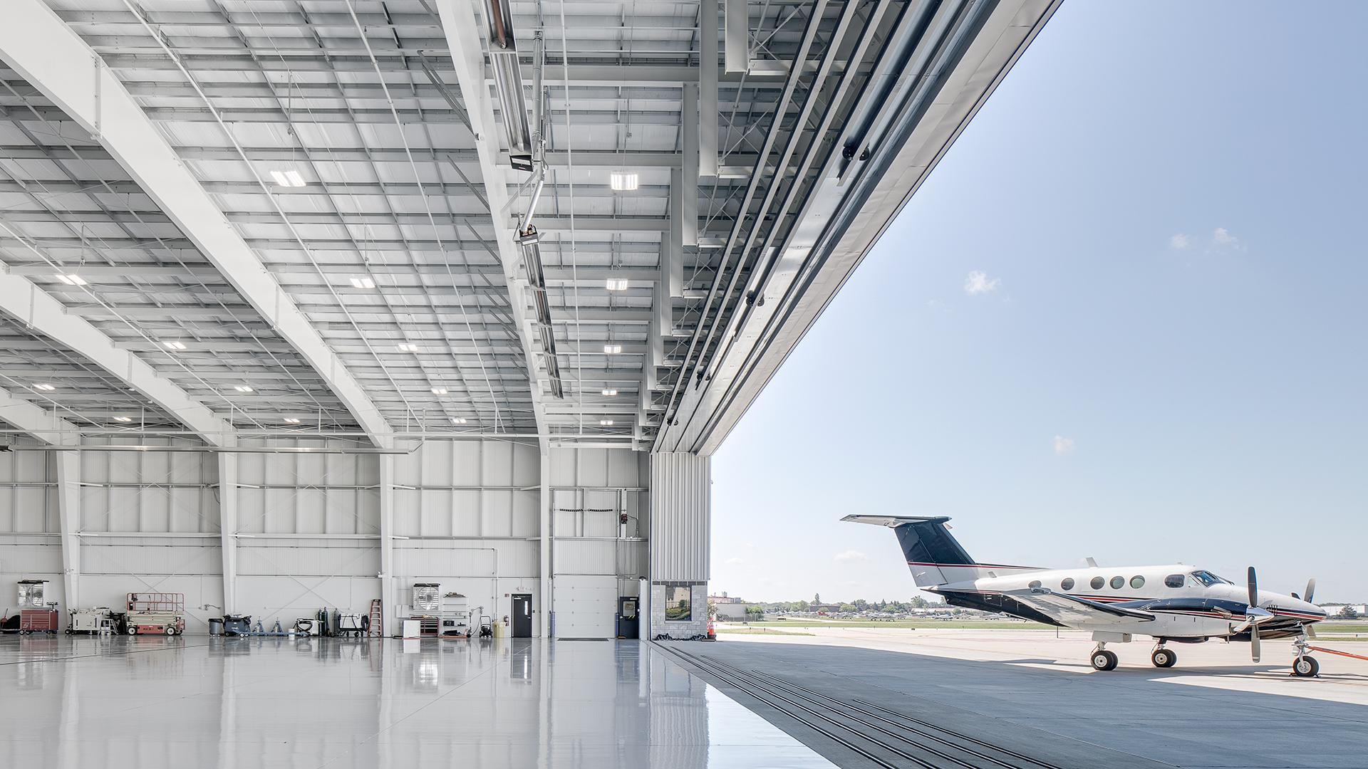 Hangars & Aviation main photo of small plane in large hangar