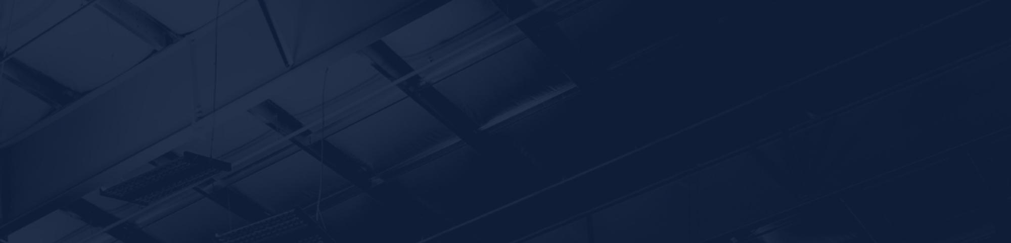 Abstract blue overlay with steel building roof structure and beams