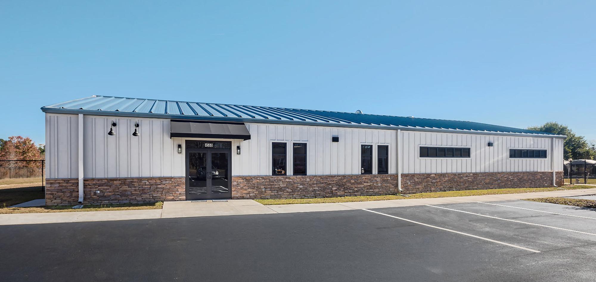 Exterior view of the Almost Home Wellness Center featuring an integrated veterinary clinic and rescue facility designed to support coordinated medical care, animal safety and efficient day-to-day operations.