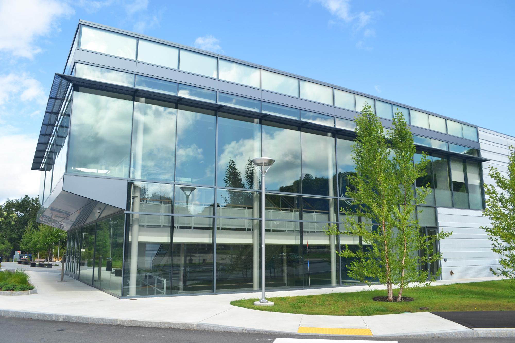 Exterior view of Bentley University’s multi-use Sports and Recreation facility featuring expansive glass curtainwall design