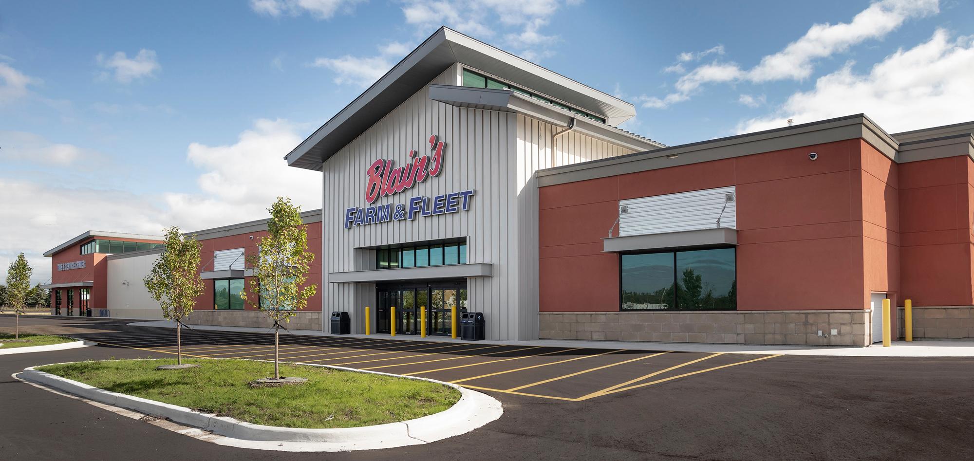Exterior view of the Blain’s Farm & Fleet retail facility featuring an expansive storefront, integrated customer access and a flexible retail environment designed to support high traffic, operational efficiency and long-term usability.