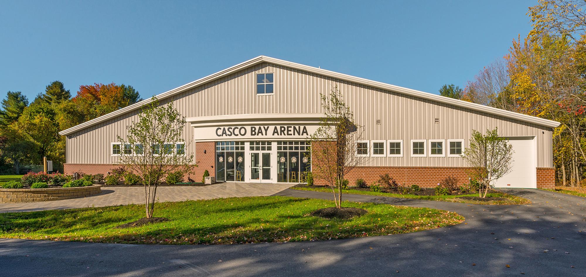 Exterior view of Casco Bay Arena featuring a community-focused indoor hockey facility designed to support year-round ice performance, efficient operations and reduced energy demand through coordinated building systems.