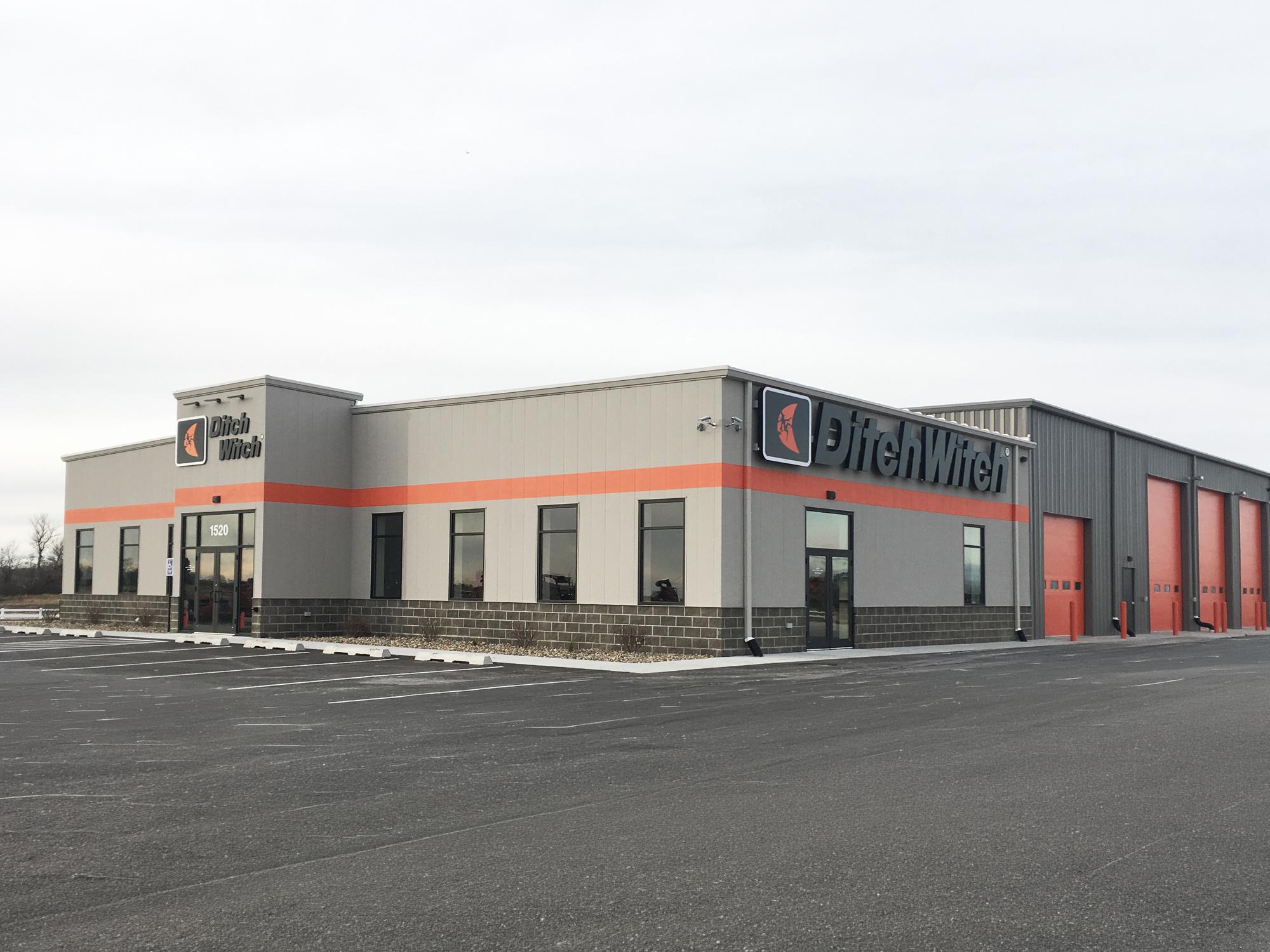 Exterior view of the Ditch Witch of Minnesota & Iowa facility featuring office space, service bays and retail operations.