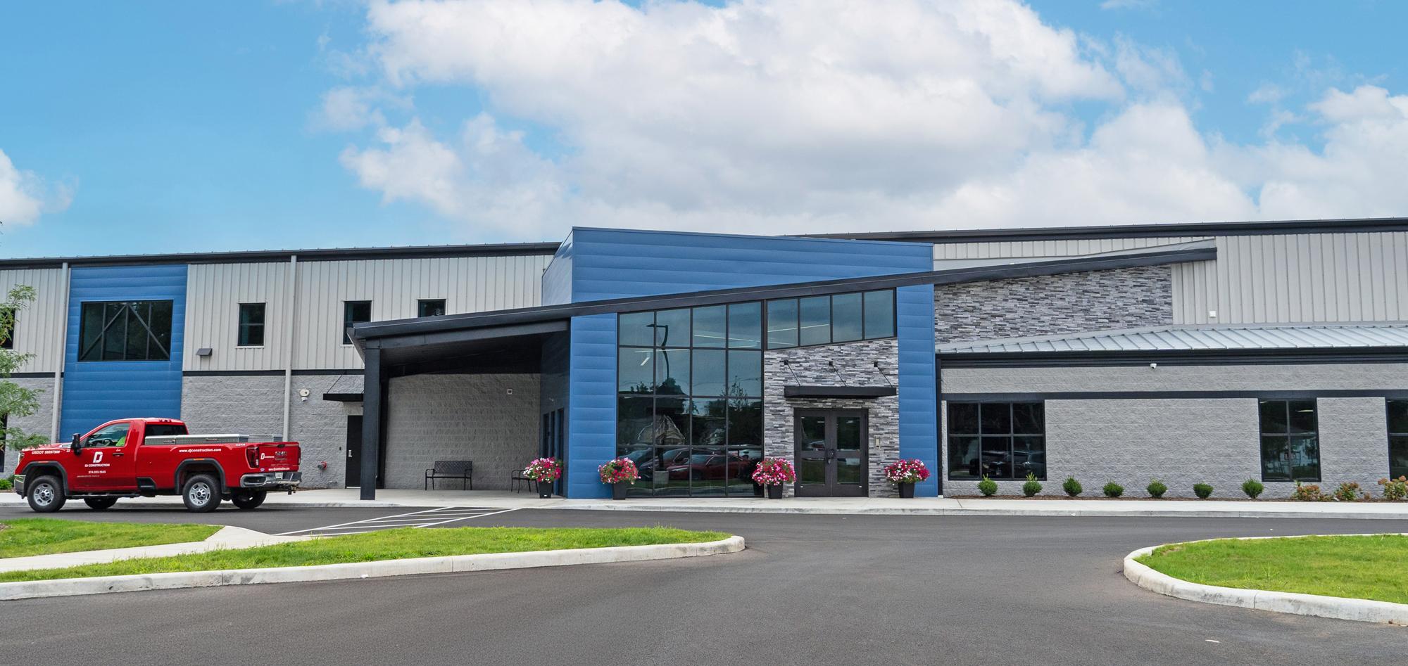 Exterior view of the Lifeline Ministries HUB featuring integrated education, recreation and community gathering spaces designed to support flexible daily programming and year-round community engagement.